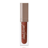 Beauty For Real Rebel Rebel lip gloss in deep maroon metallic for rich color and shine.