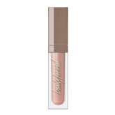 Beauty For Real Starlust lip gloss cap with LED light for precise application.