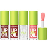 Beauty Glazed lip oil application with big brush head for precise, even coverage and gloss.
