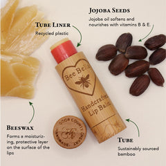 Bee Bella lip balm cherry tube beside natural cherry imagery