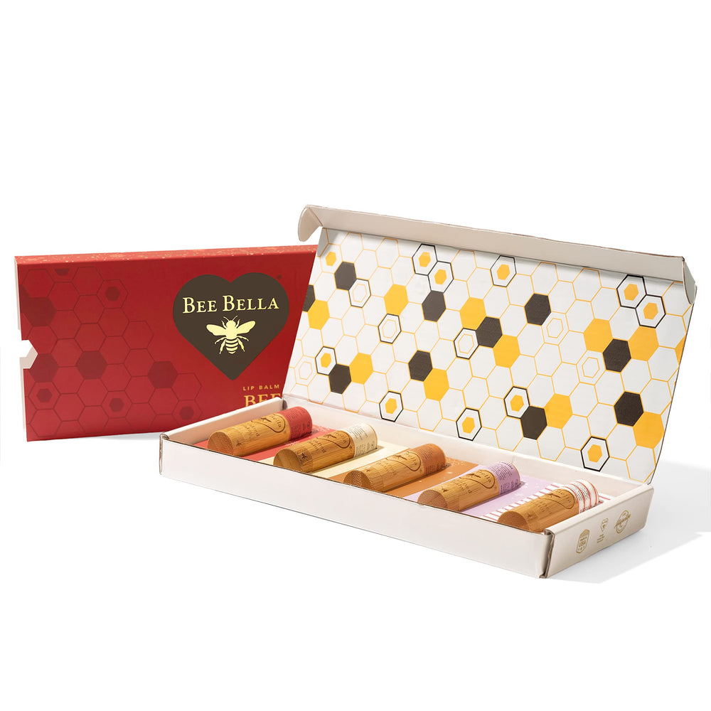 Bee Bella lip balm Cherry flavor in festive gift packaging.