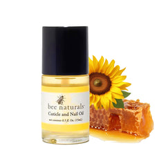 Bee Naturals Nail & Cuticle Oil bottle closeup, rich moisturizing formula.