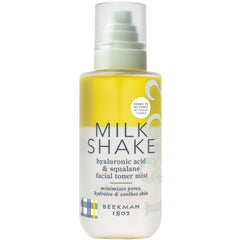 Beekman 1802 Milk Shake Face Mist bottle closeup highlights hydrating formula.