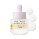 Beekman 1802 Milk Drops Ceramide Serum bottle highlights fragrance-free, hydrating formula for sensitive skin.