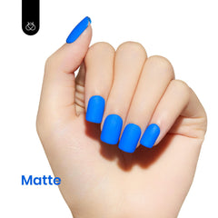 Beetles Blue Gel Nail Polish DIY manicure application on nails.