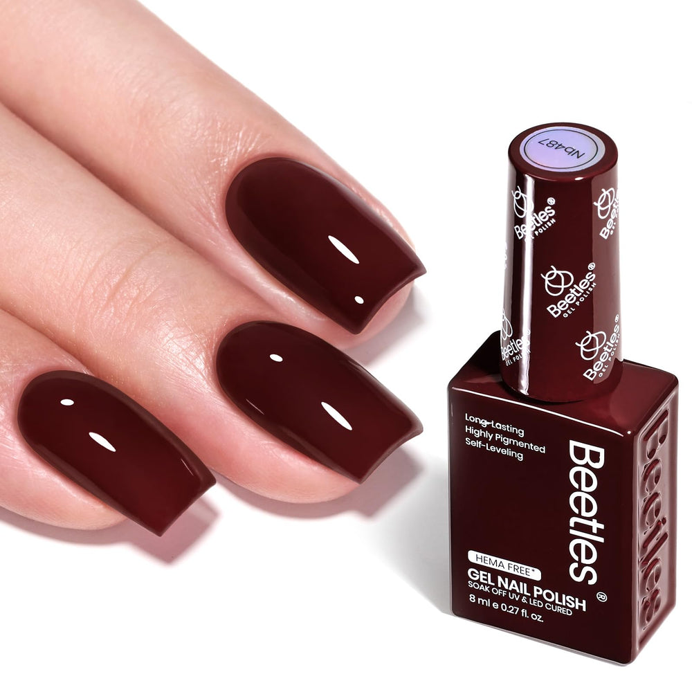 Beetles Burgundy Gel Polish merlot wine bottle shows rich color and long-lasting shine