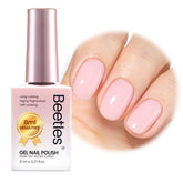 Beetles Nude Pink gel polish bottle close-up showing a natural nude shade and shine