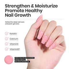 Beetles Nude Rubber Base Gel hand applying natural overlays