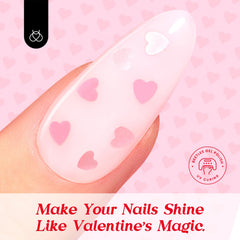 Beetles Pink Heart Top Coat delivers long-lasting sparkle on nails.