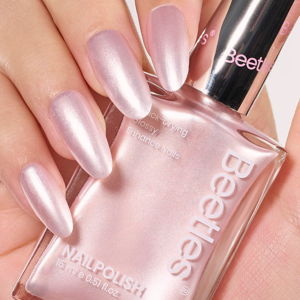 Beetles Pink Pearl Nail Polish bottle close-up with rose nude shimmer.