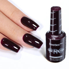 Beetles Pro Currently Crushing Burgundy Glitter bottle showing rich color payoff.