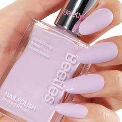Beetles Purple Nail Polish bottle top view, glossy lilac shade for chic nails.