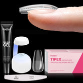 Beetles Tipex Gel Nail Kit contents show 224 tips, glue, lamp, and file.