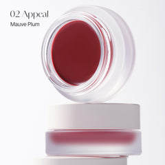 BEIGIC balm swatch on hand shows buildable mauve-plum shade