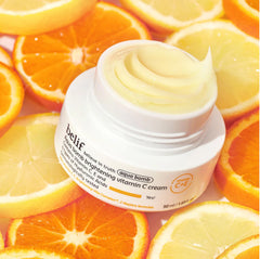 belif Aqua Bomb gel-cream applied to cheek for dewy hydration.