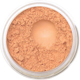 Bellaterra Mineral Foundation Latte compact demonstrates buildable coverage for a natural look.