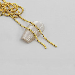Bellecrey 100cm nail chain in gold and silver for creative manicures.