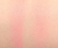 Benefit Dandelion powder applied to cheeks as a gentle pink blush for daytime warmth.