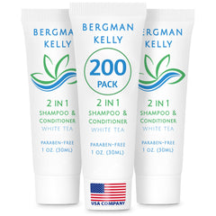 BERGMAN KELLY travel-size 2in1 bottle with white tea scent in guest bathroom