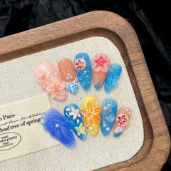 BHOOKA starfish embossed nails provide shimmering texture for seaside looks