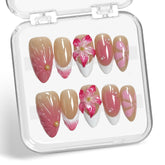 BHOOKA white French tip nails with flower and pearl accents for elegant daily wear.