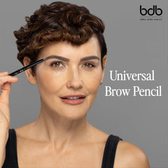 Billion Dollar Brows spoolie blending for seamless grooming.