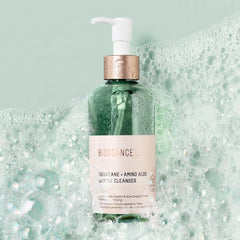 BIOSSANCE foaming cleanser lather demonstrating deep cleansing while preserving moisture