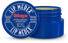 Close-up of Blistex Lip Medex balm texture on lips for cooling relief.