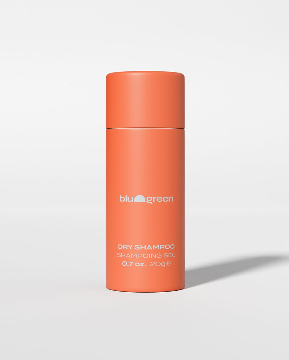 Blu & Green dry shampoo powder bottle pour enhances refreshment by absorbing excess oil.