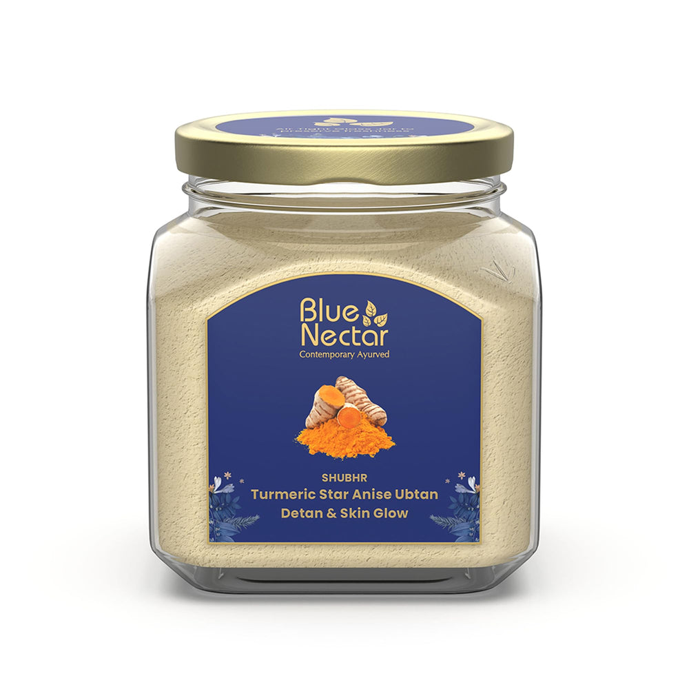 Blue Nectar turmeric ubtan powder pack enhances gentle exfoliation for radiant skin.