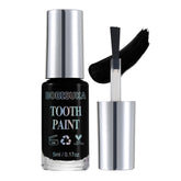 BOBISUKA black tooth paint application on teeth for bold cosplay color.