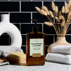 Body Prescriptions Crimson and Oak hand soap closeup of pump bottle revealing Teakwood and Thyme fragrance