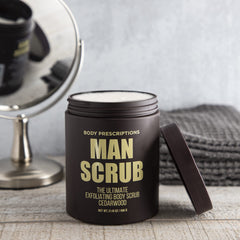 Body Prescriptions Exfoliating Scrub texture closeup shows gritty particles for skin renewal.