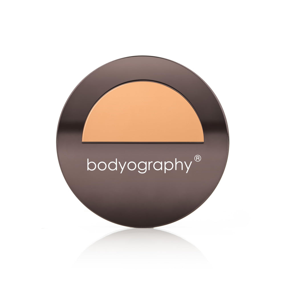 Bodyography Silk Cream Foundation Medium bottle close-up reveals premium texture and luminous finish.