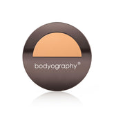 Bodyography Silk Cream Foundation Medium bottle close-up reveals premium texture and luminous finish.
