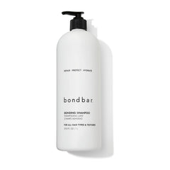 Bondbar Repairing Shampoo bottle close-up highlighting hydrating formula for all hair types.