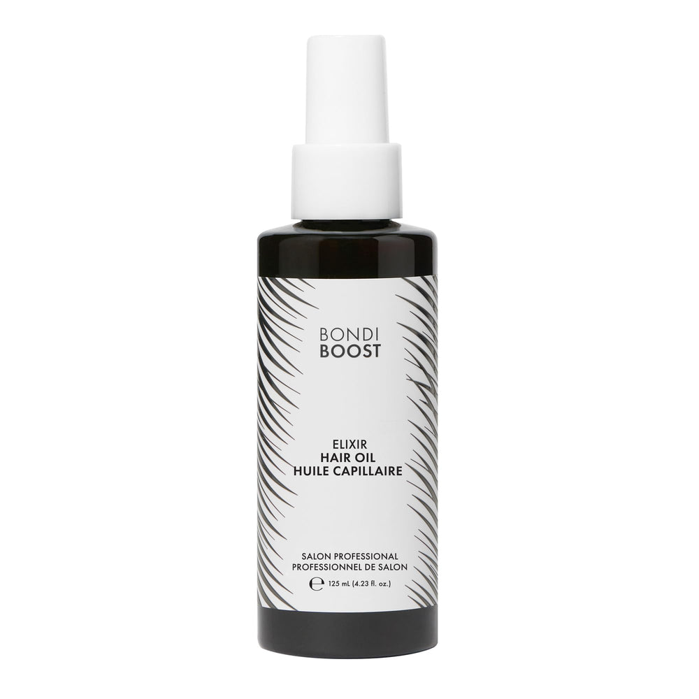 BondiBoost Elixir Hair Oil bottle pour enables easy pre-wash frizz control.
