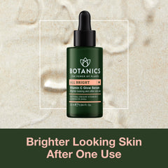 Botanics Vitamin C Serum bottle close-up with luminous glow