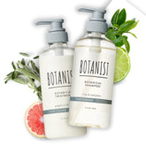 Botanist dry scalp shampoo bottle pour promotes smooth, manageable hair.
