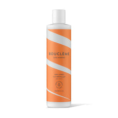 Boucléme Seal + Shield gel bottle promotes humidity defense for defined curls.