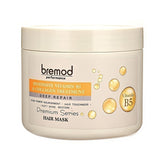 Bremod Performance Hair Mask bottle pours for deep hydration.