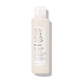 Briogeo Be Gentle Be Kind conditioner bottle pour demonstrating fragrance free soothing hydration