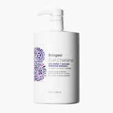 Briogeo Curl Charisma shampoo bottle pours to hydrate curls