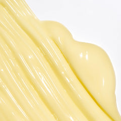 Briogeo conditioner bottle pour shows creamy texture ideal for detangling.
