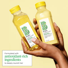 Briogeo Banana + Coconut Conditioner seals moisture for smooth strands.