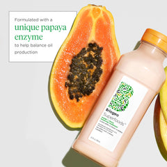 Briogeo Superfoods Mango Cherry Balancing Conditioner bottle label closeup conveys natural, vegan formula