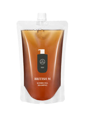 British M Kombucha Shampoo bottle, vegan formula for gentle scalp cleansing.