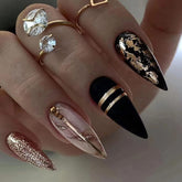 BSBTBZ Black Almond press-on nails with gold foil design for stylish at-home manicure