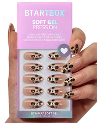 BTArtbox Gilder Roar almond nails with sparkly leopard closeup for a natural-looking manicure.
