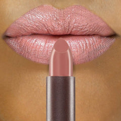 Creamy texture close up highlights smooth lip feel of Burts Bees lipstick.